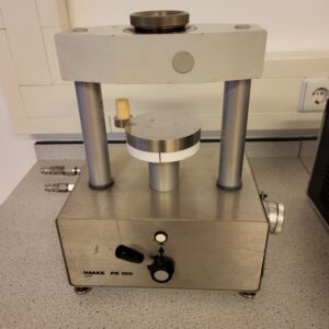 Used HAAKE PK 100 Cone and Plate Measuring System for viscosity measurements, with circulator connection and temperature-controlled measuring plate.