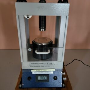 Used Manual KBr Pellet Press for FTIR and IR spectroscopy sample preparation, with safety guard and digital force display; die set not included.