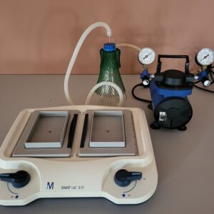 Used Millipore SNAP i.d. 2.0 Midi protein detection system with WP6122050 vacuum pump, blot holders, collection flask and tubing for Western blotting.